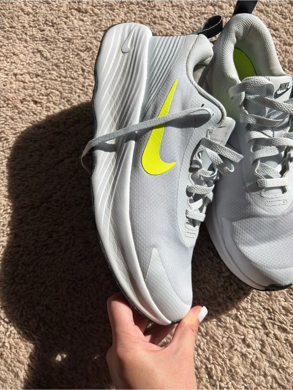 Nike Men’s Light Grey Running Shoes with Neon Yellow Swoosh